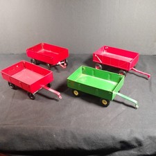 Lot of 4 Vintage ERTL Pressed Metal Toy Farm Wagon Trailers John Deere Harvester