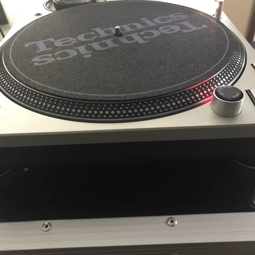 Technics SL-1200M3D turntable with road case works well has needle and cartridge