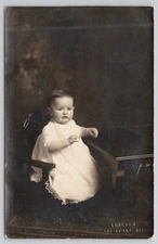Real Photo Postcard Child with Dark Hair in Letcher Studio Dodgeville WI RPPC
