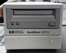 HP Hewlett Packard SureStore DAT24 DDS 4mm External Tape Drive C5653 + 30 tapes