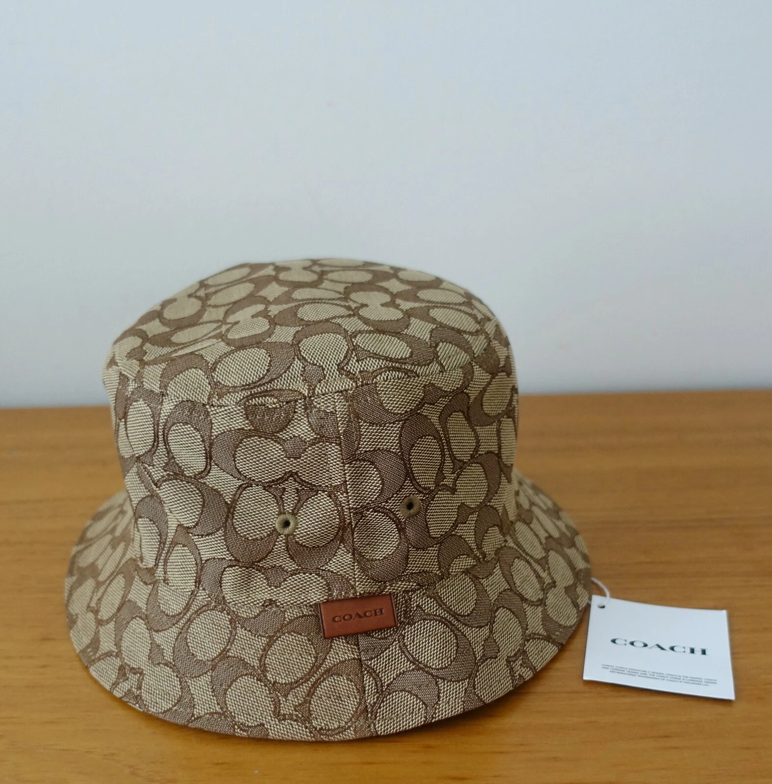 COACH BUCKET HAT IN KHAKI COLOR. NWT