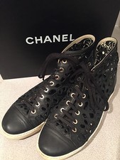 Authentic Chanel black leather camelia high top sneakers 40.5- 1095