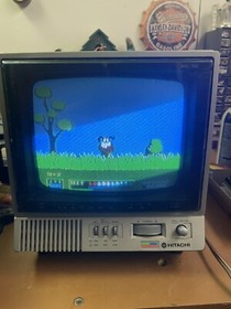 Nintendo NES console bundle with controllers, zapper, and games Tested