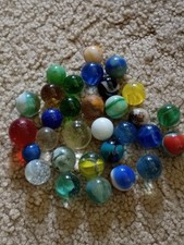 31 Vintage Mixed Variety Glass Playing Marbles.