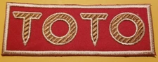 Embroidered Toto Rock pop band Patch approx 1.5x4.5"