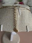 Vintage Christian Dior Gold Tone Heart Knot Pendant Necklace with Rhinestones — photo 3
