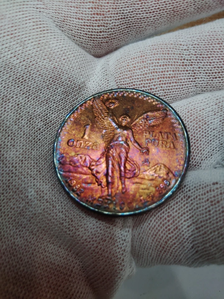 1982 Mexican Libertad Onza Toned 1 oz Silver Coin Great toning - Image 3 of 4