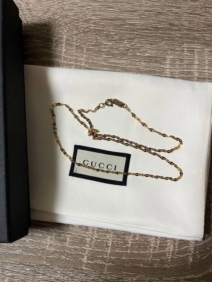 Collier doré GUCCI collaboration Wacko Maria luxe pendentif bijou