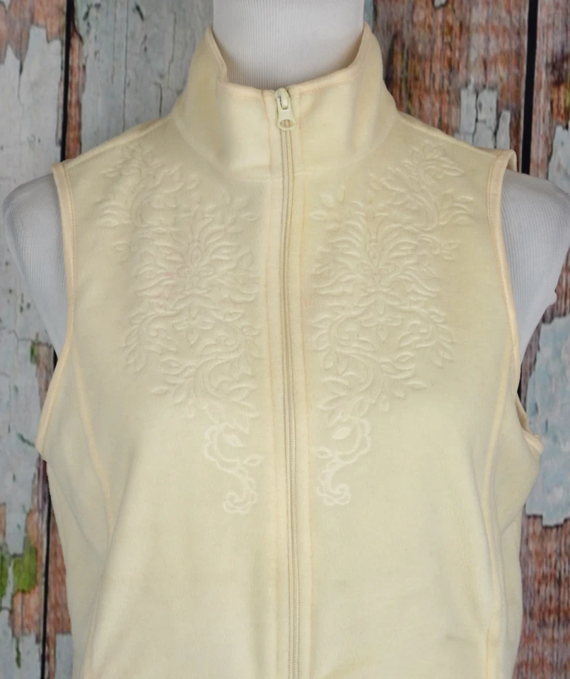 Chaleco polar pequeño para mujer con cremallera frontal en relieve floral marfil ediciones básicas Foto 2 de 4