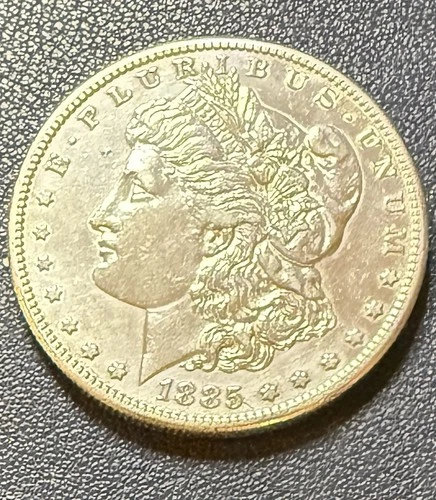 1885-S About Uncirculated 90% silver Morgan dollar.  Free Fast Shipping.