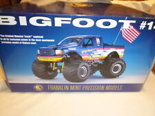 A Franklin mint Big foot monster truck, with flag, boxed