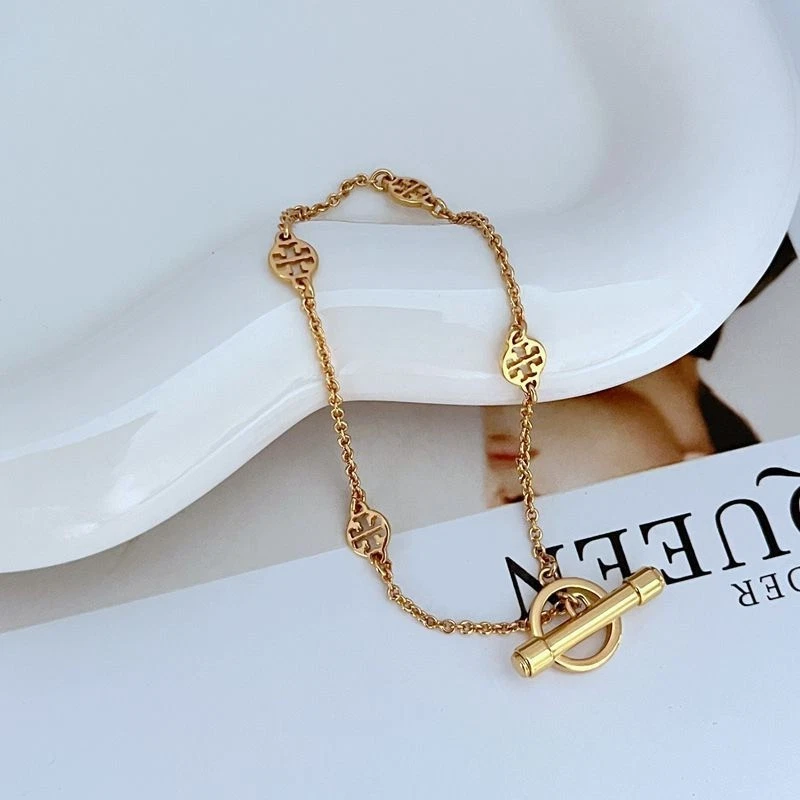 ¡Nuevo! Pulsera de cadena con logotipo Tory TB dorada con bolsa de joyería tamaño: 21 cm Foto 4 de 4