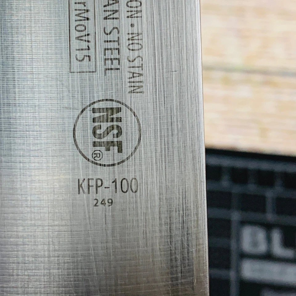 Cuchillo de Chef Winco Acero 10" Acero Alemán Alto Carbono Sin Manchas NSF KFP-100 Foto 4 de 4
