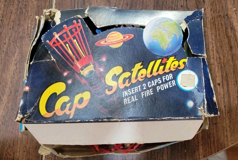 Full Box Of Cap Satellites. Box Has Wear And Top Not Attached. See Photos.