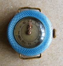 Petite montre bracelet femme en émail bijou ancien MGBM Genève Suisse