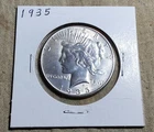 1935 DATED U.S. PEACE DOLLAR SILVER COIN (AU) ALMOST UNCIRCULATED CONDITION