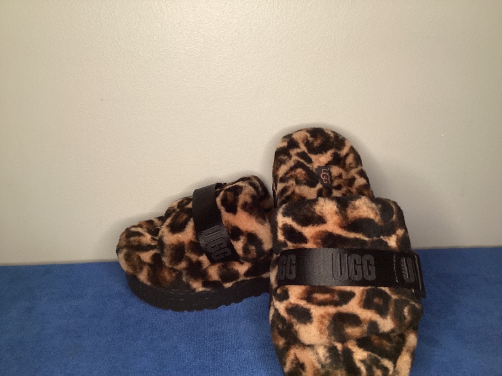UGG Women's Fluffita panther print slipper slides