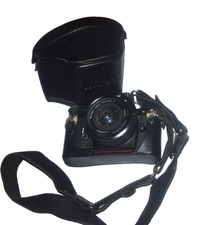 NIKON EM 35mm film camera with Series E 50mm 1.1.8 Lens and Case