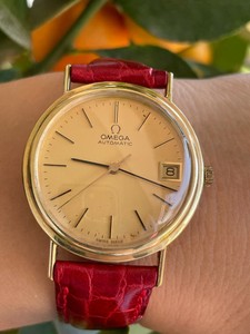 omega reloj oro