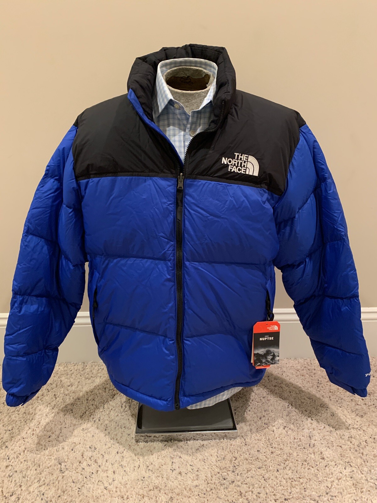 supreme puffer jacket retail