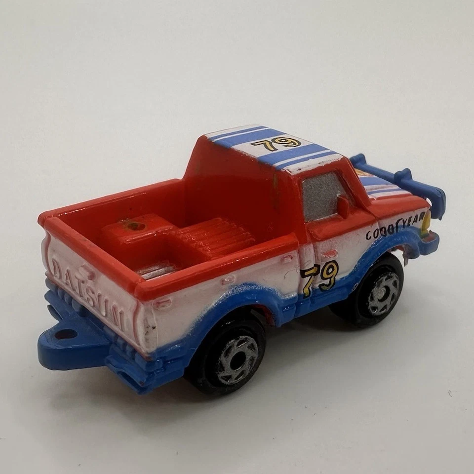 Galoob Micro Machines Datsun Shell 标志越野皮卡车(无滚杆)1989 — 第 3/4 张图片