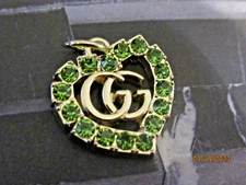 GUCCI  ZIP PULL   22X20MM gold tone,  GREEN  CRYSTALS THIS IS FOR 1 heart