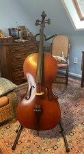 Cello with stand, bow and padded case