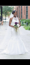 wedding dress size 4-6. Only worn once on wedding day. Comes with veil