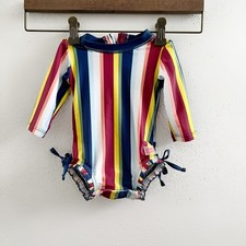 RUFFLEBUTTS One Piece Rashguard in the "Sunset Stripe" Pattern Size 3-6 Months