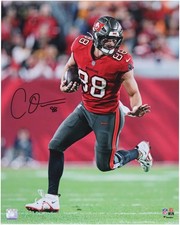 Cade Otton Tampa Bay Buccaneers Signed 16x20 Red Jersey Running with Ball Photo