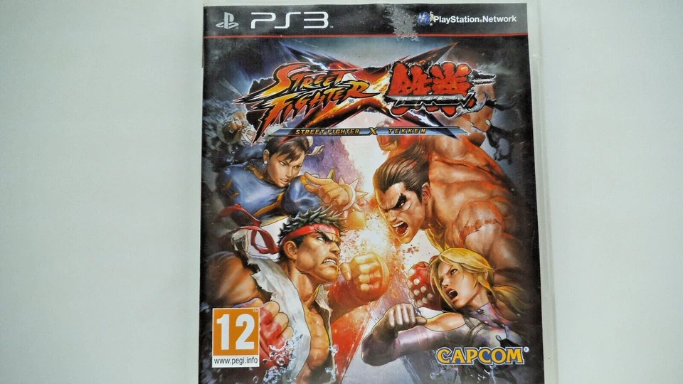 Street Fighter  X Tekken  (  Playstation 3)   Handbuch,  komplett ,  ( spanisch) - Bild 1 von 4