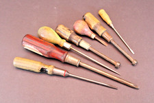 VTG 7 Wood handled tools: 2 nut drivers, 3 flat screwdrivers, 1 Phillips, 1 Awl
