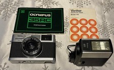 Antique Olympus Camera and Vivitar Flash