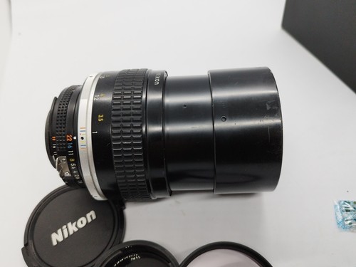 Obiettivo Nikon Ai-S 105mm F/1.8 Nikkor MF buone condizioni con tappi filtro venditore UK - Foto 7 di 24