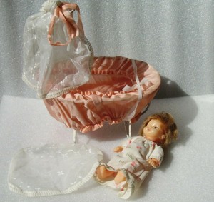 plastic doll cradle