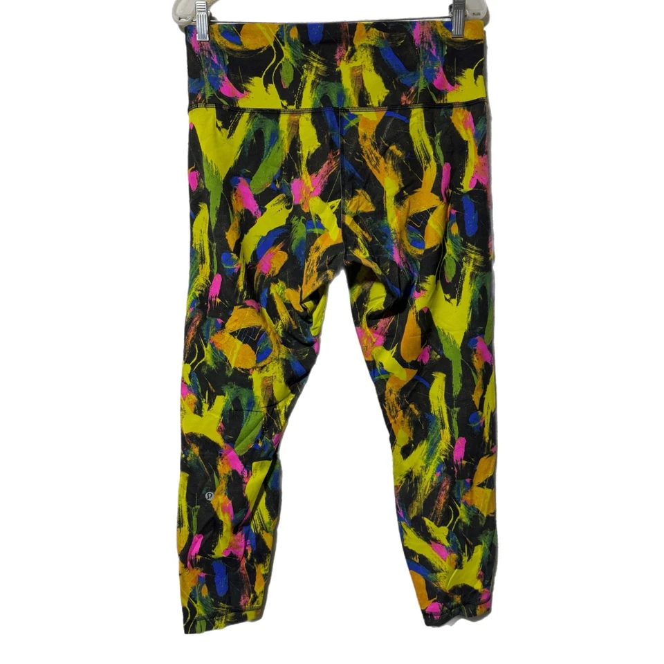 Leggings ajustados Lululemon Wunder Train tiro alto 14 Undertone negros multi neón Foto 3 de 4