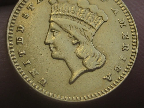 Photo of a 1876-P Gold Dollar from an eBay listing that sold on Jun 14, 2026