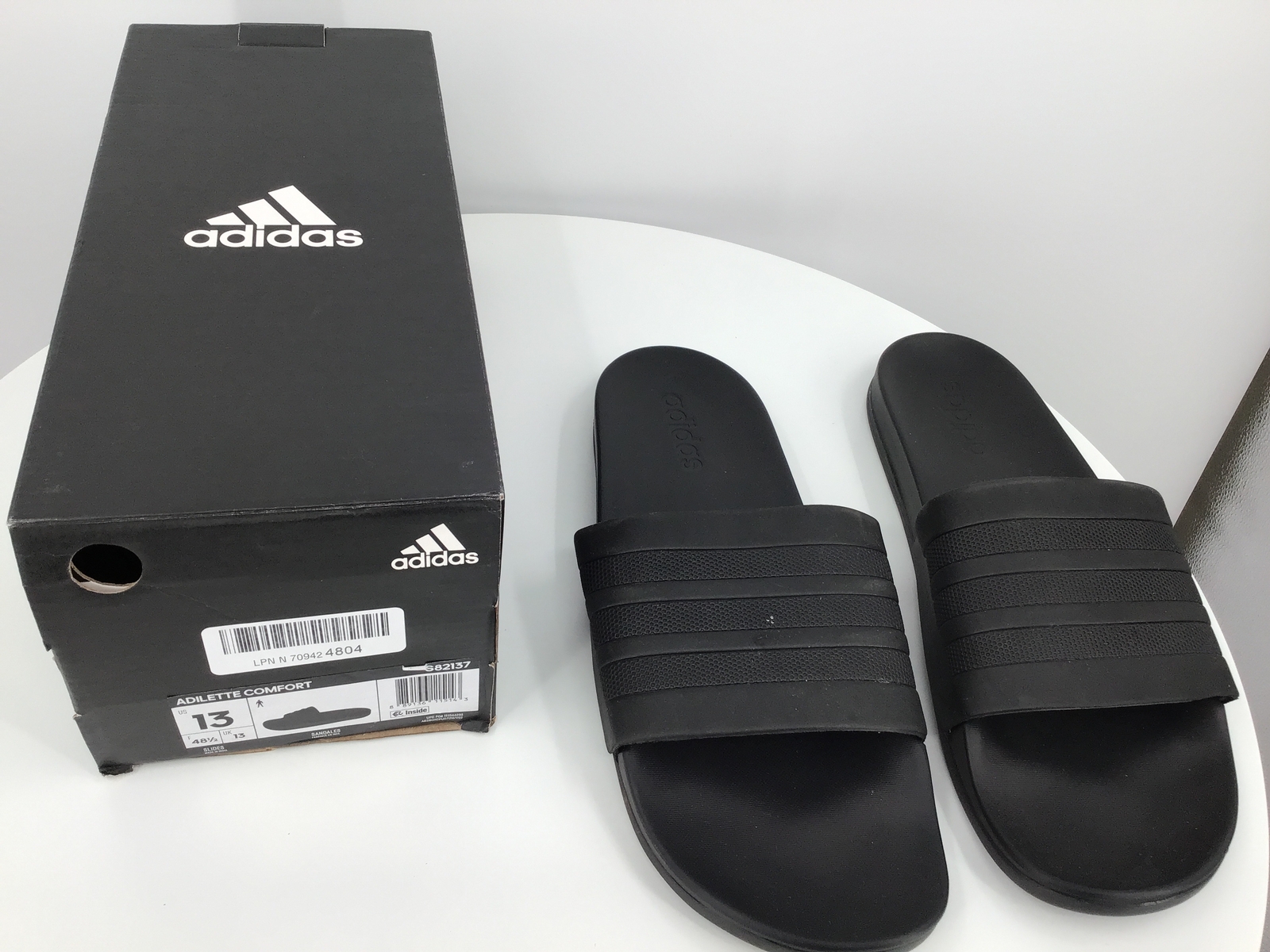 black on black adidas slides