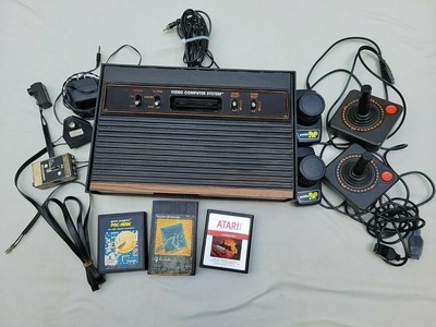Vtg Atari 2600 Video Computer System 2 paddles 2 joysticks all cords