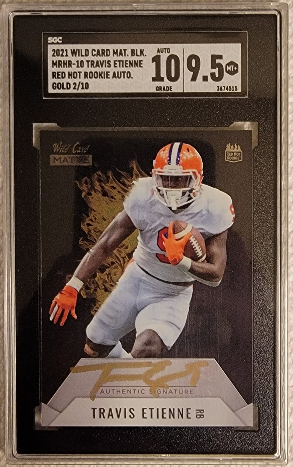 Travis Etienne Wild Card Matte White Premier Edition Red Hot Rookie Autographs #MRHR10 Gold