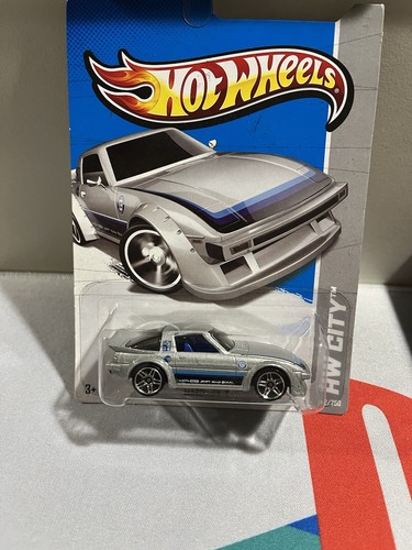 (1) Hot Wheels RRRoadster Super Treasure Hunt. (1) Mazda RX7 Regular Treasure - Picture 8 of 10