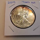 United States Mint 2014 American Silver Eagle 1 oz .999 Silver, Toned, Uncert
