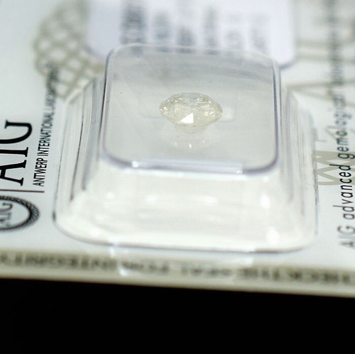 0.71 Ct Round natural brilliant Color G, I2 clarity with AIG report - Picture 6 of 8