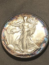 1942 W Walking Liberty mezzo dollaro tono arcobaleno FDC 