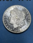 1884-O $1 Morgan Silver Dollar Bu Condition with cool O/O  and semi PL