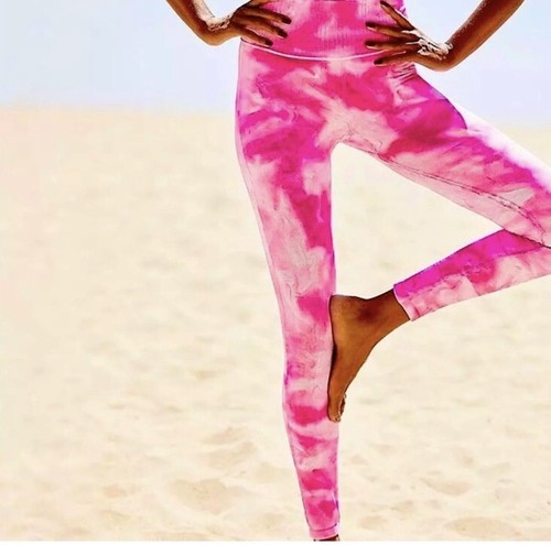 NWT FREE PEOPLE MOVEMENT Good Karma leggings size M/L pink astor combo