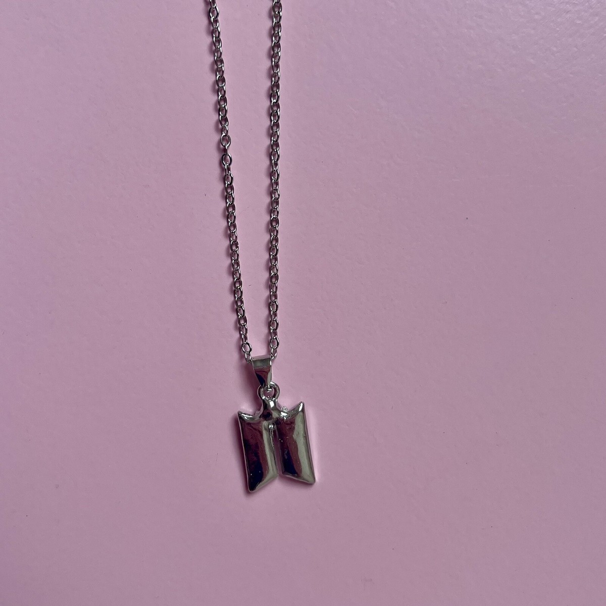 BTS logo silver coloured necklace. Jungkook Jimin V Bangtan