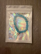Plastic Aqua Beaded Bracelet With Shell And Rhinestone Accents