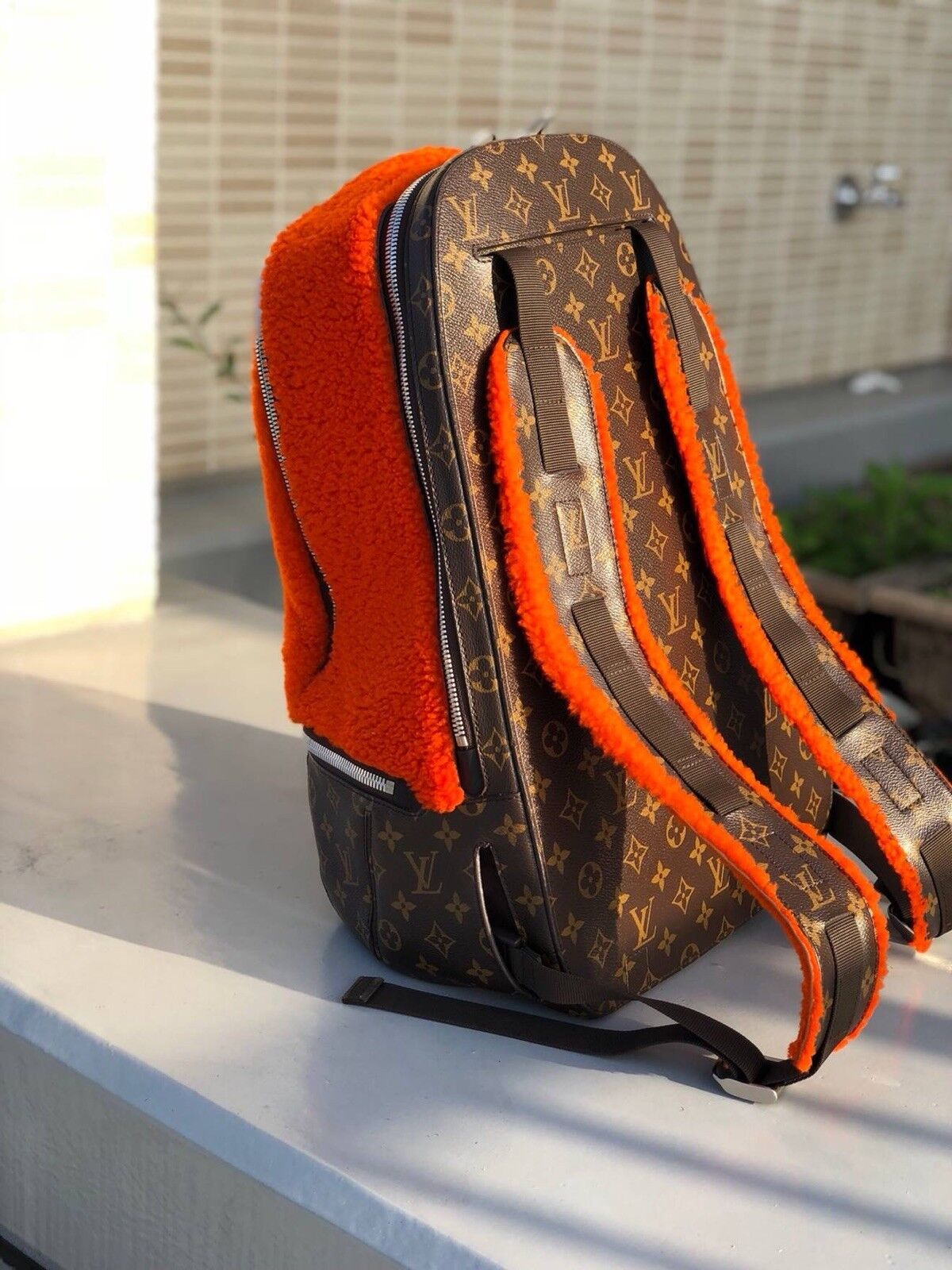 Louis Vuitton Marc Newson Backpack Shearling and Monogram Canvas at 1stDibs   louis vuitton backpack orange, louis vuitton beanie orange, louis vuitton  fur backpack