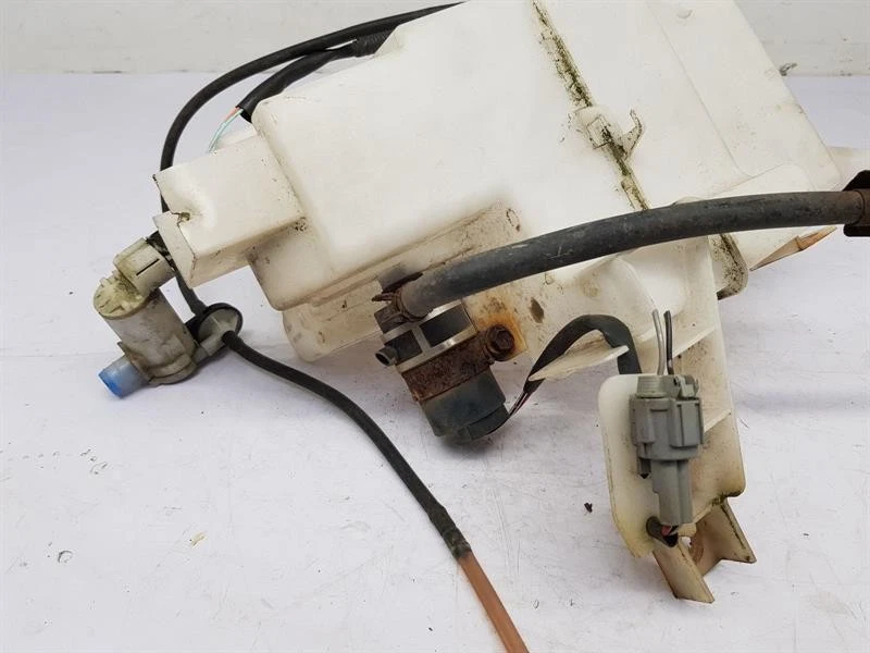 Nissan X-Trail 2010 botella lavadora pantalla  Foto 4 de 4